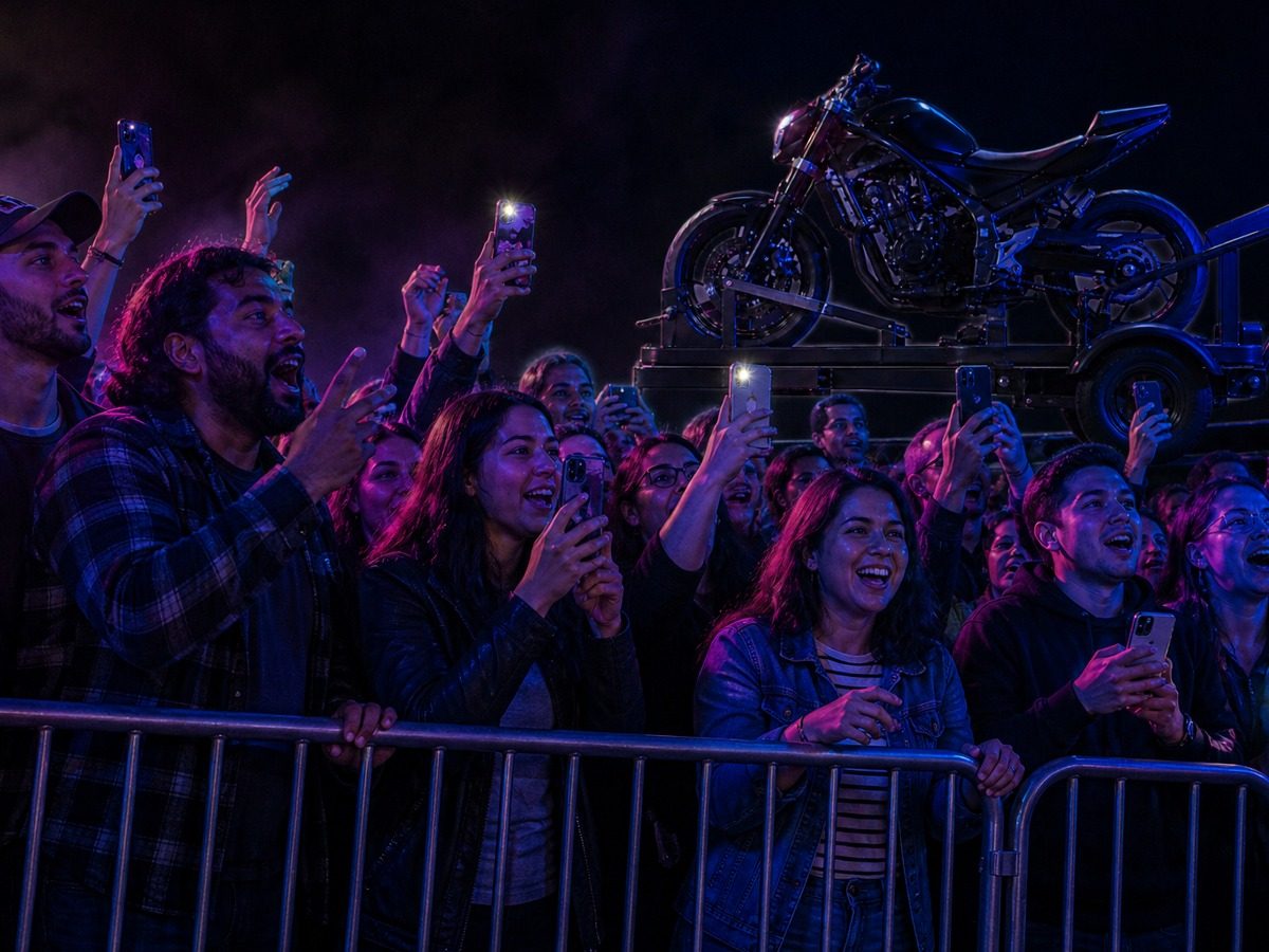 Crowd watching the wheelie machine from the rails